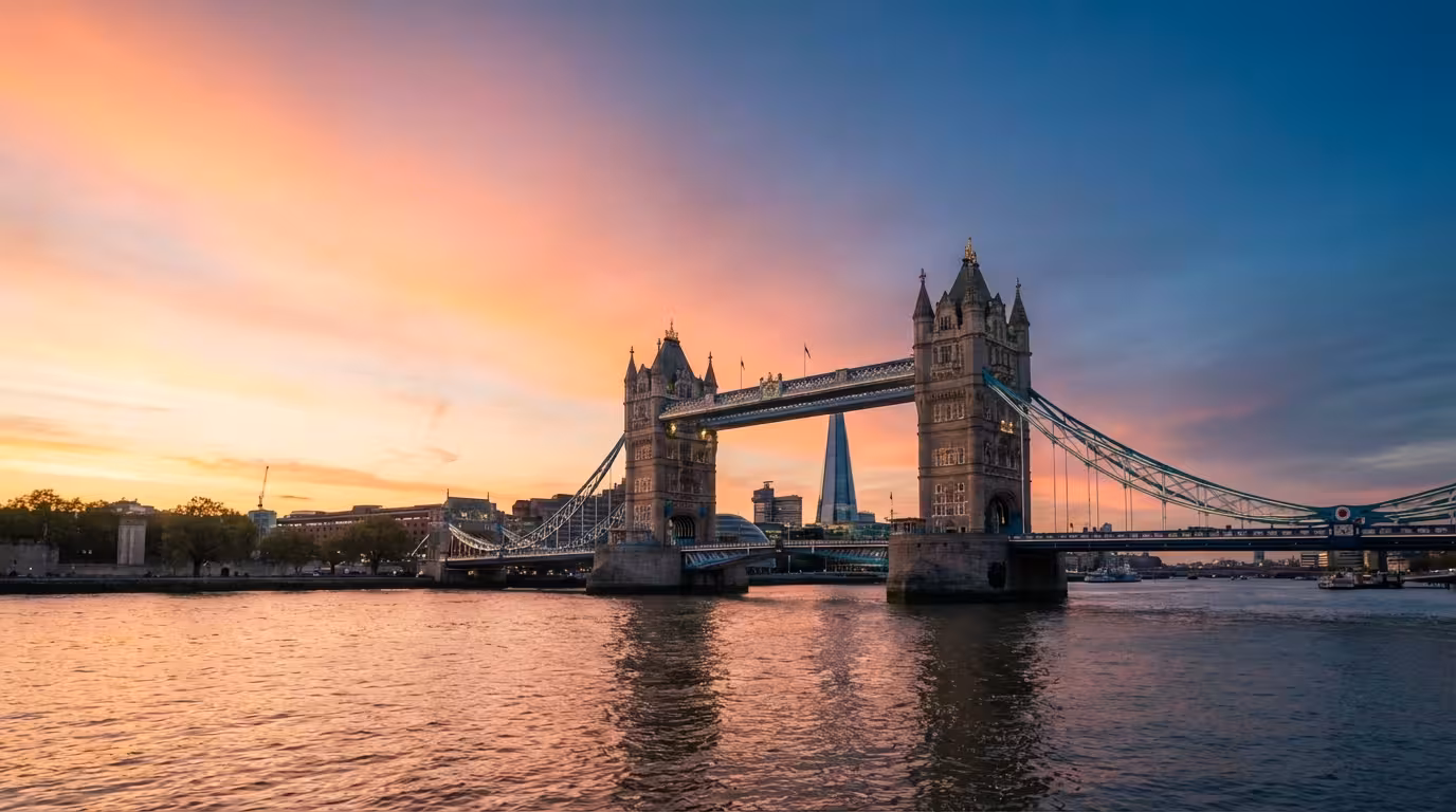 Sugar Baby London — Tower Bridge and the Thames at sunset, the heart of London's sugar dating scene